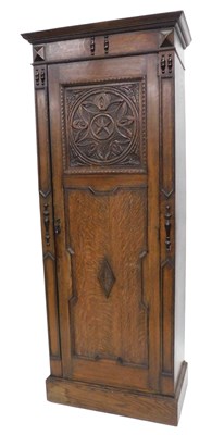 Lot 1011 - A 1920s oak hall robe, with a moulded cornice...