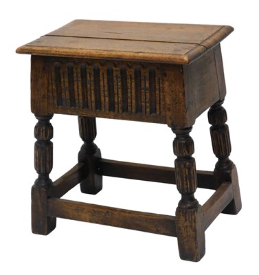 Lot 927 - An oak work table in 17thC style, the hinged...