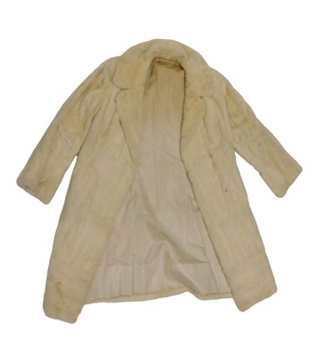 Lot 861 - A lady's white Ermine fur coat, with satin...