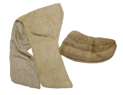 Lot 864 - A white ermine stole, and another fur stole. (2)