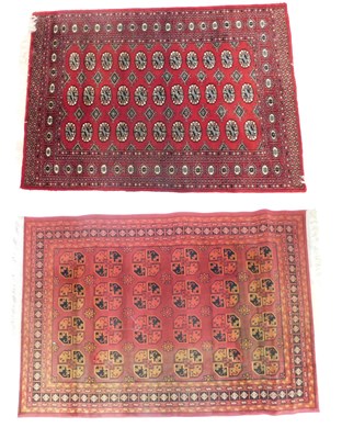 Lot 1014 - An Afghan type Bokhara Deluxe rug, with a...