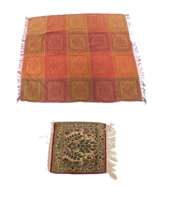 Lot 1018 - A small Persian rug or mat, with a floral...