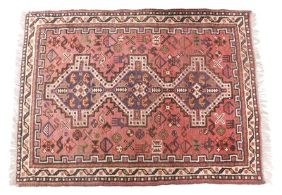 Lot 1024 - A Persian rug, with a central pole medallion,...