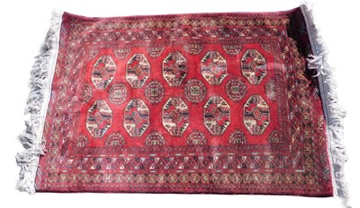 Lot 1026 - A Persian type rug, with a design of two rows...