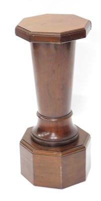Lot 946 - A mahogany pedestal, the octagonal top on a...