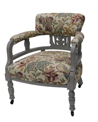 Lot 985 - An Edwardian tub chair, upholstered in flower...