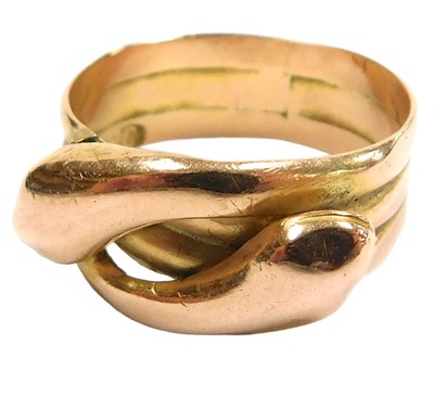 Lot 111 - A double entwined serpent band, yellow metal...