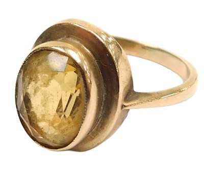 Lot 107 - A 9ct gold and citrine single stone ring, the...