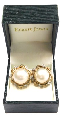 Lot 102 - A pair of blister pearl and diamond set...