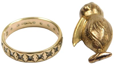 Lot 320 - A 9ct gold Pelican charm, together with CZ...