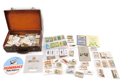 Lot 671A - A collection of cigarette cards, to include...