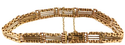 Lot 215 - A four bar gate bracelet, on a snap clasp,...