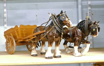 Lot 2054a - A ceramic cart horse, with leatherette tack,...