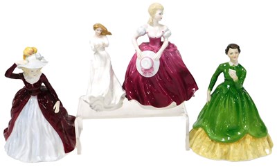 Lot 47 - Three Coalport porcelain figures, modelled as...