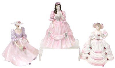 Lot 50 - Three Coalport porcelain figures, modelled as...