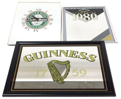 Lot 68 - A Heineken Lager advertising wall clock, with...
