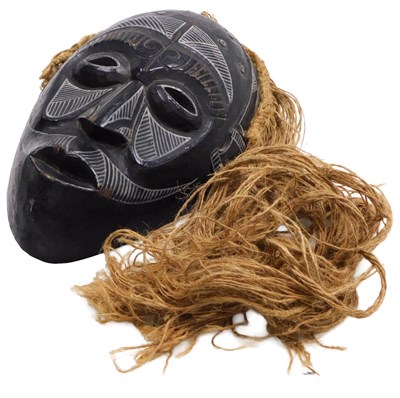 Lot 80 - A Congolese Chokwe tribal mask, with painted...