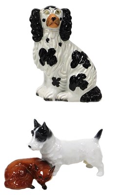 Lot 97 - A Beswick pottery figure of a fox, modelled in...