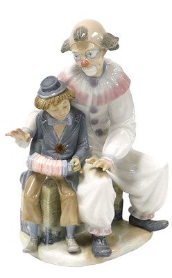 Lot 100 - A Nao porcelain figure group, of a clown and...