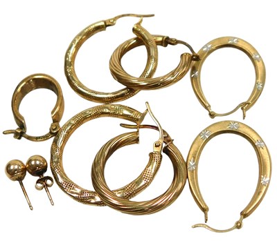 Lot 117 - Three pairs of 9ct gold hoop earrings, a...