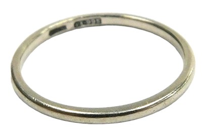 Lot 125 - A wedding band, white metal, stamped PT995,...