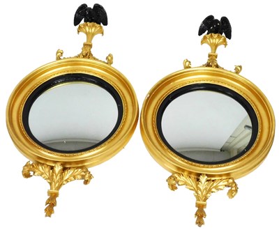 Lot 6 - A pair of Regency gilt wood and ebonised...