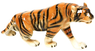 Lot 188 - A Royal Dux porcelain figure of a tiger, in...