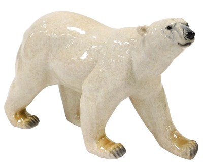 Lot 190 - A pottery figure of a polar bear, with mottled...