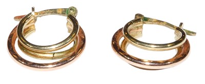 Lot 334 - A pair of 9ct two colour gold triple ring...
