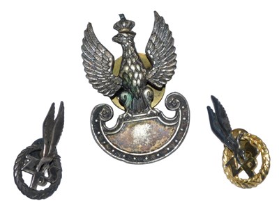 Lot 296 - A World War II Polish Forces eagle cap...