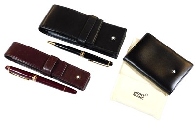 Lot 295 - A Mont Blanc red cased fountain pen, with a...