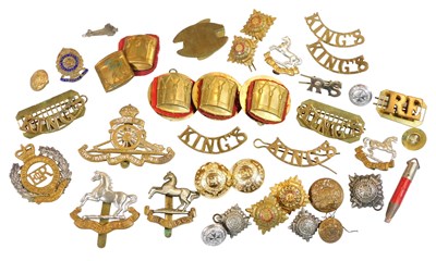 Lot 294 - A group of military cap badges and buttons,...