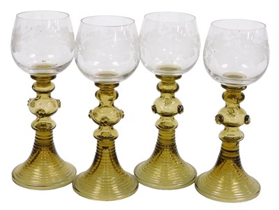 Lot 272 - A set of four continental clear and green...