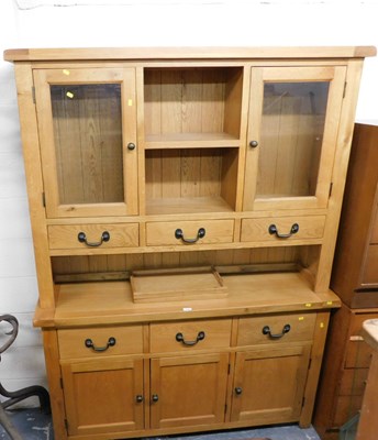 Lot 1003 - An oak sideboard, the top section with two...