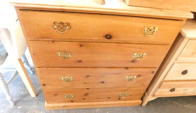 Lot 1004 - A pine chest, the top with a rounded edge...