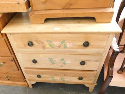 Lot 1005 - A pine chest of three long drawers, with...