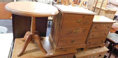 Lot 1006 - A pine low three drawer chest, on bracket feet,...