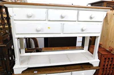Lot 1009 - A pine side table, the top with a moulded edge...