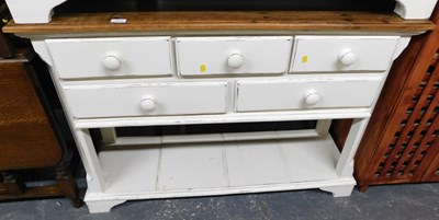 Lot 1010 - A pine side table, the top with a moulded edge...