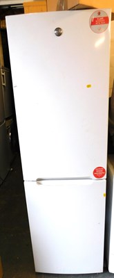 Lot 1024 - A Hoover fridge freezer.