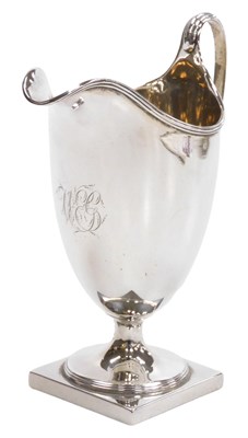 Lot 377 - A George III silver helmet shaped cream jug,...
