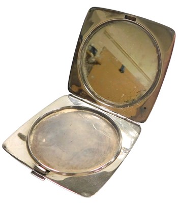Lot 372 - An Art Deco compact, with engine turned...