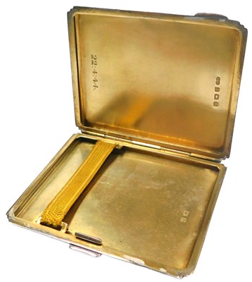 Lot 378 - A George VI silver cigarette case, with engine...