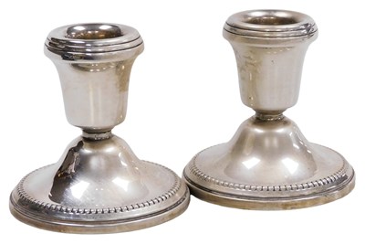 Lot 401 - A pair of Elizabeth II loaded silver squat...