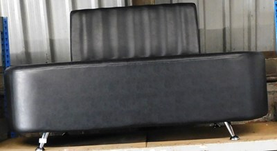 Lot 1152 - A black leatherette upholstered sofa, 130cm wide.