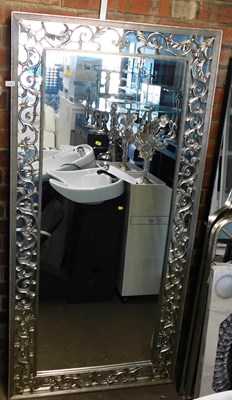 Lot 1169 - A wall mirror, of rectangular form, with a...