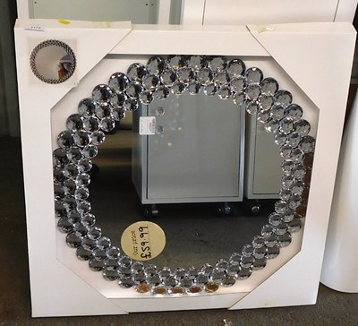 Lot 1174 - A circular wall mirror, surrounded by three...