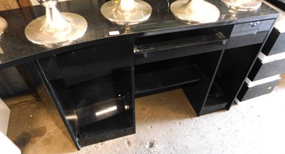 Lot 1181 - A black gloss shop counter, multi level, 124cm...