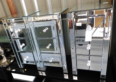 Lot 1184 - Three mirrored three drawer cabinets, 61cm...