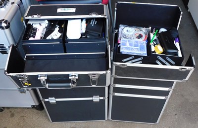 Lot 1199 - Two beautician's portable trollies, containing...